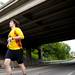 A runner goes under a bridge on Huron River Drive during the Ann Arbor Marathon on Sunday, June 9. Daniel Brenner I AnnArbor.com